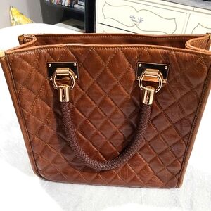 Italian leather, tufted purse